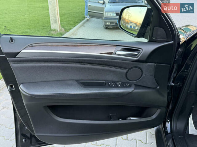Чорний БМВ Х6 М, об'ємом двигуна 3 л та пробігом 300 тис. км за 31000 $, фото 25 на Automoto.ua