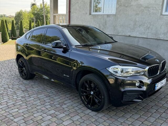 Черный БМВ Х6 М, объемом двигателя 3 л и пробегом 180 тыс. км за 34500 $, фото 1 на Automoto.ua