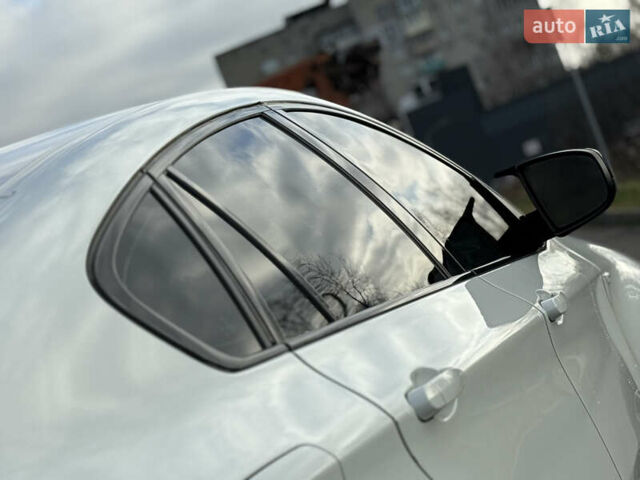 Білий БМВ Х6, об'ємом двигуна 3 л та пробігом 303 тис. км за 17850 $, фото 39 на Automoto.ua