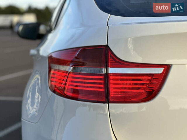 Белый БМВ Х6, объемом двигателя 3 л и пробегом 320 тыс. км за 18850 $, фото 17 на Automoto.ua