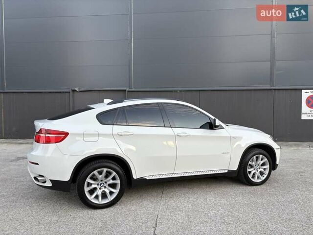 Белый БМВ Х6, объемом двигателя 3 л и пробегом 245 тыс. км за 15650 $, фото 28 на Automoto.ua