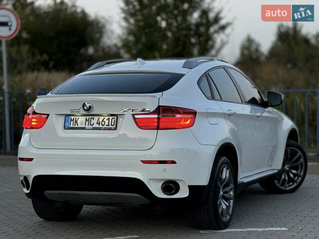 Белый БМВ Х6, объемом двигателя 3 л и пробегом 200 тыс. км за 22800 $, фото 32 на Automoto.ua