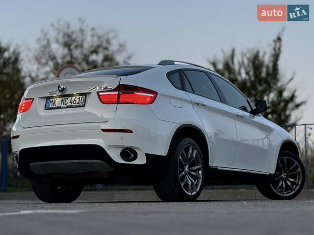 Белый БМВ Х6, объемом двигателя 3 л и пробегом 200 тыс. км за 22800 $, фото 31 на Automoto.ua