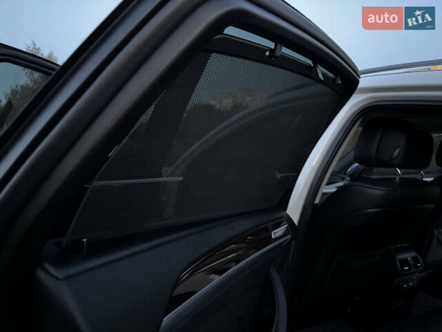 Белый БМВ Х6, объемом двигателя 3 л и пробегом 200 тыс. км за 22800 $, фото 68 на Automoto.ua