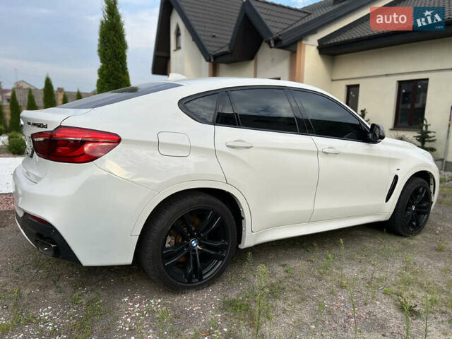 Белый БМВ Х6, объемом двигателя 2.99 л и пробегом 158 тыс. км за 40900 $, фото 4 на Automoto.ua