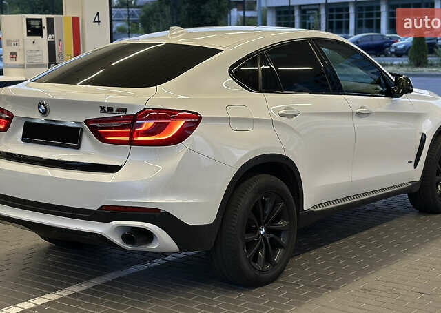 Белый БМВ Х6, объемом двигателя 3 л и пробегом 157 тыс. км за 25999 $, фото 4 на Automoto.ua