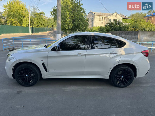 Белый БМВ Х6, объемом двигателя 2.99 л и пробегом 115 тыс. км за 39999 $, фото 1 на Automoto.ua