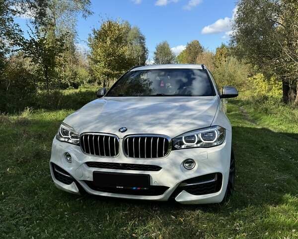 Белый БМВ Х6, объемом двигателя 3 л и пробегом 102 тыс. км за 51999 $, фото 1 на Automoto.ua