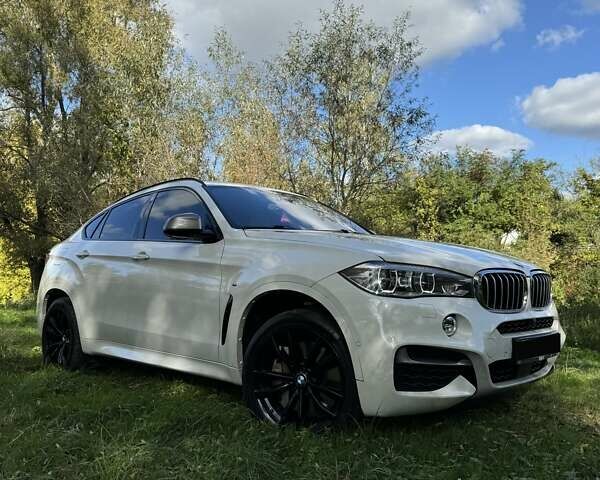 Белый БМВ Х6, объемом двигателя 3 л и пробегом 102 тыс. км за 51999 $, фото 4 на Automoto.ua