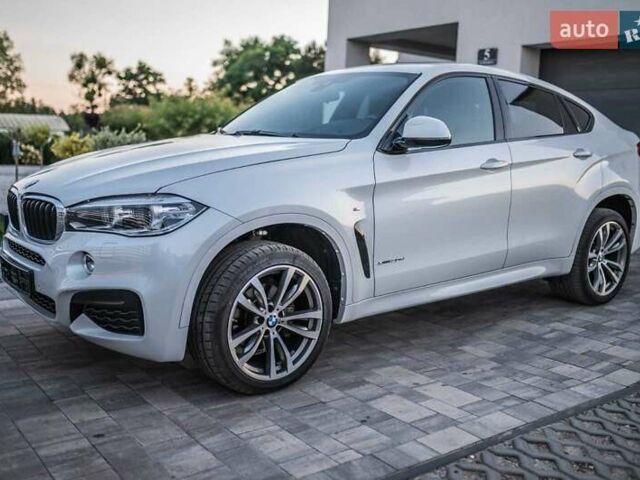 Белый БМВ Х6, объемом двигателя 3 л и пробегом 300 тыс. км за 33549 $, фото 1 на Automoto.ua