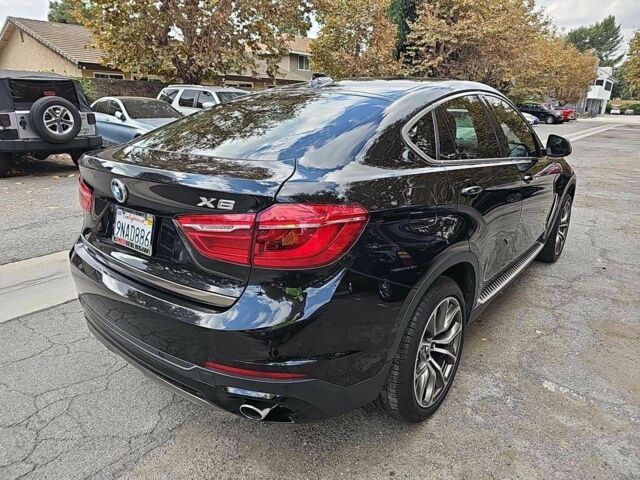 Черный БМВ Х6, объемом двигателя 0 л и пробегом 90 тыс. км за 14000 $, фото 3 на Automoto.ua