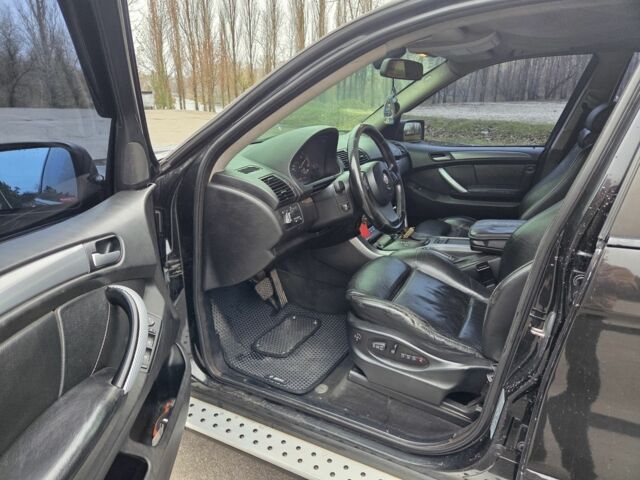 Черный БМВ Х6, объемом двигателя 3 л и пробегом 369 тыс. км за 10500 $, фото 4 на Automoto.ua