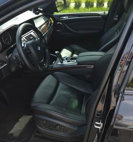 Черный БМВ Х6, объемом двигателя 4.4 л и пробегом 150 тыс. км за 20000 $, фото 12 на Automoto.ua