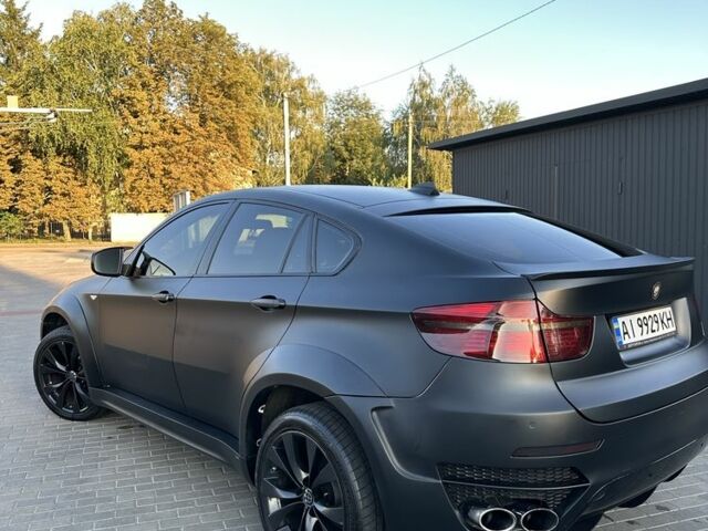 Черный БМВ Х6, объемом двигателя 3 л и пробегом 215 тыс. км за 13999 $, фото 1 на Automoto.ua