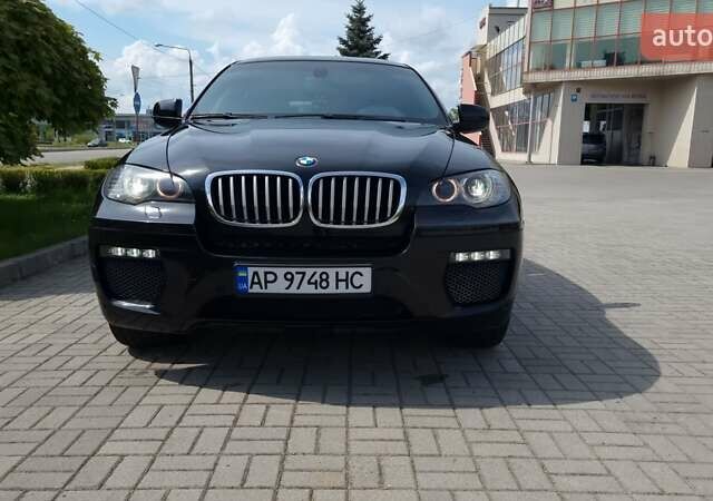 Черный БМВ Х6, объемом двигателя 4.4 л и пробегом 150 тыс. км за 20000 $, фото 1 на Automoto.ua