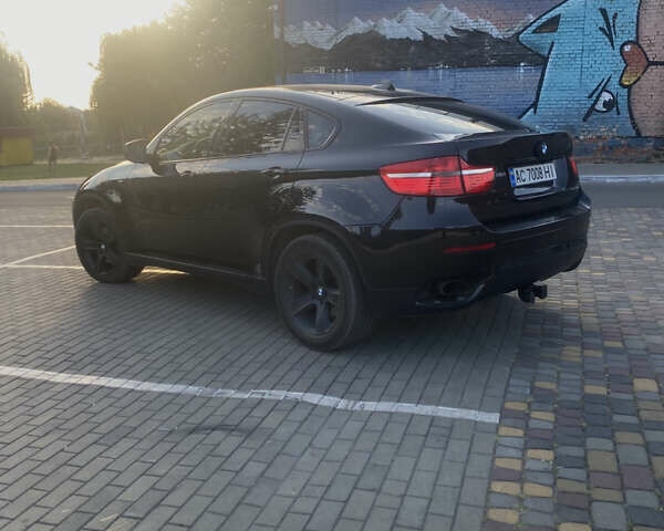 Чорний БМВ Х6, об'ємом двигуна 3 л та пробігом 235 тис. км за 13700 $, фото 3 на Automoto.ua