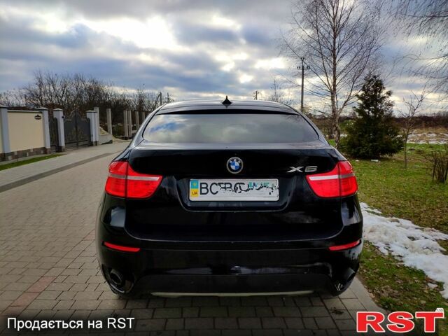 Чорний БМВ Х6, об'ємом двигуна 3 л та пробігом 80 тис. км за 15900 $, фото 4 на Automoto.ua