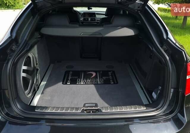 Черный БМВ Х6, объемом двигателя 4.4 л и пробегом 150 тыс. км за 20000 $, фото 9 на Automoto.ua