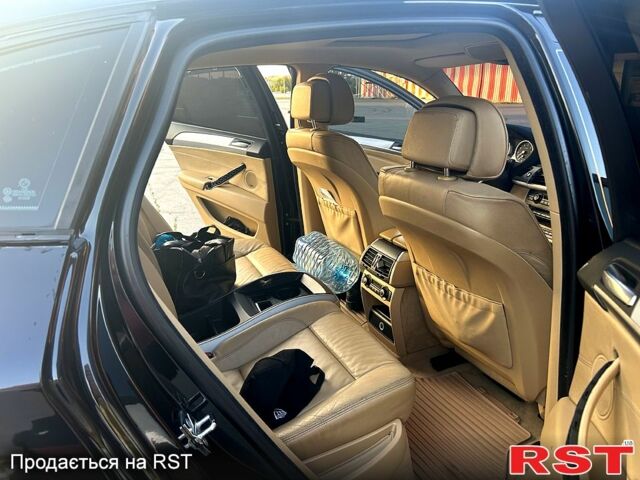 Чорний БМВ Х6, об'ємом двигуна 3 л та пробігом 300 тис. км за 15600 $, фото 4 на Automoto.ua