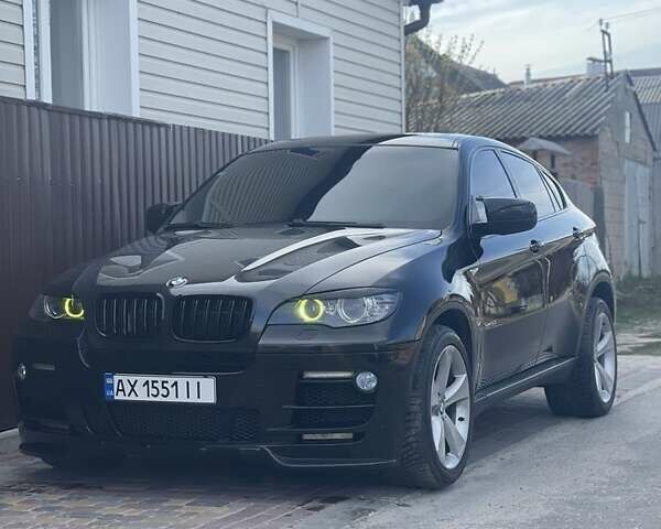 Черный БМВ Х6, объемом двигателя 4.4 л и пробегом 230 тыс. км за 17400 $, фото 1 на Automoto.ua