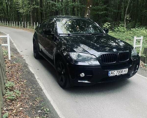 Черный БМВ Х6, объемом двигателя 3 л и пробегом 236 тыс. км за 13700 $, фото 1 на Automoto.ua