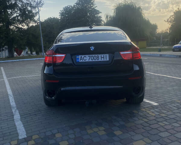 Чорний БМВ Х6, об'ємом двигуна 3 л та пробігом 235 тис. км за 13700 $, фото 4 на Automoto.ua
