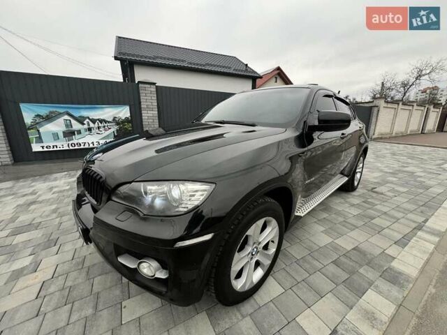 Черный БМВ Х6, объемом двигателя 3 л и пробегом 266 тыс. км за 14950 $, фото 1 на Automoto.ua