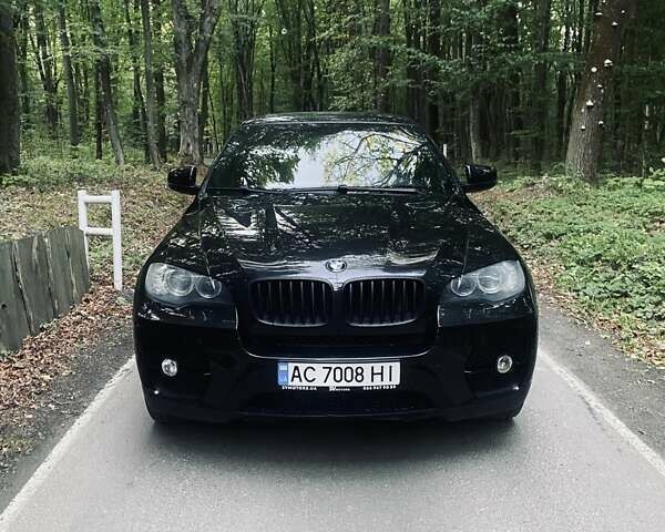 Черный БМВ Х6, объемом двигателя 3 л и пробегом 236 тыс. км за 13700 $, фото 2 на Automoto.ua