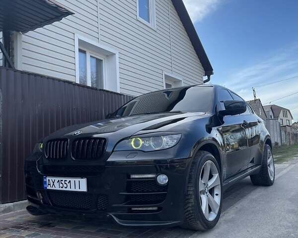Черный БМВ Х6, объемом двигателя 4.4 л и пробегом 230 тыс. км за 16800 $, фото 3 на Automoto.ua