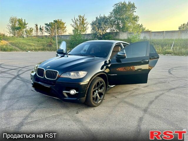 Чорний БМВ Х6, об'ємом двигуна 3 л та пробігом 300 тис. км за 15600 $, фото 1 на Automoto.ua