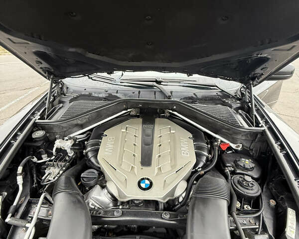 Черный БМВ Х6, объемом двигателя 4.4 л и пробегом 215 тыс. км за 15000 $, фото 1 на Automoto.ua