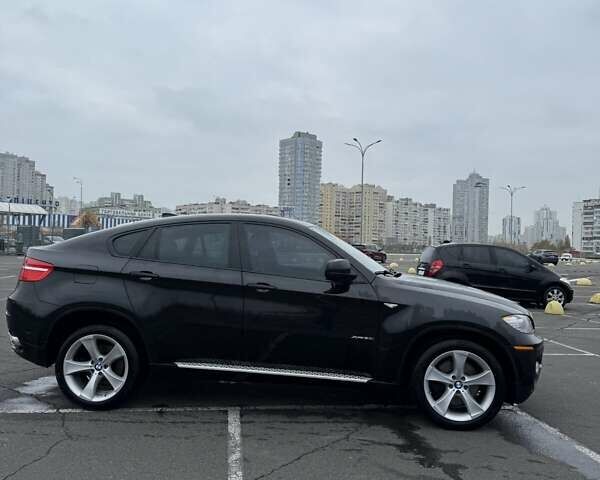 Черный БМВ Х6, объемом двигателя 4.4 л и пробегом 215 тыс. км за 12500 $, фото 4 на Automoto.ua