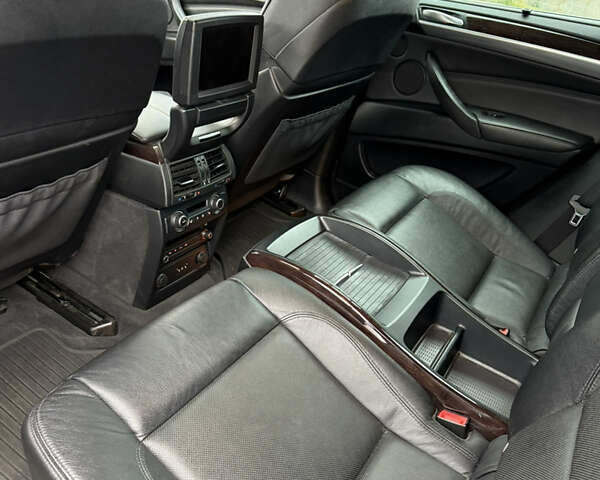 Черный БМВ Х6, объемом двигателя 4.4 л и пробегом 215 тыс. км за 15000 $, фото 2 на Automoto.ua