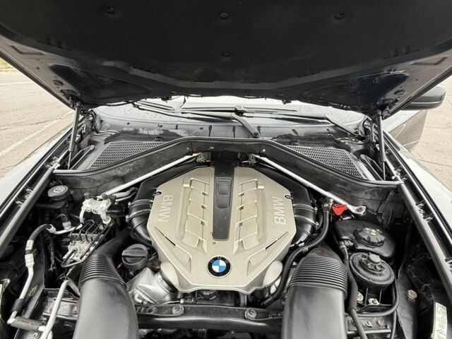 Черный БМВ Х6, объемом двигателя 4.4 л и пробегом 215 тыс. км за 15000 $, фото 1 на Automoto.ua