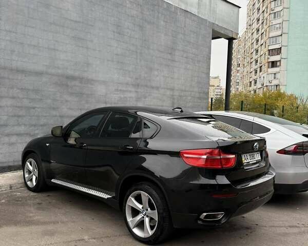 Черный БМВ Х6, объемом двигателя 4.4 л и пробегом 215 тыс. км за 12500 $, фото 1 на Automoto.ua