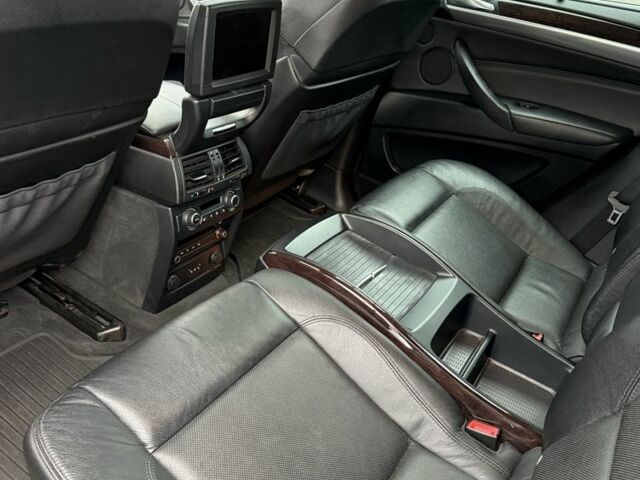 Черный БМВ Х6, объемом двигателя 4.4 л и пробегом 215 тыс. км за 15000 $, фото 2 на Automoto.ua