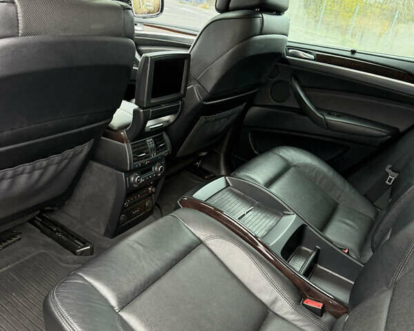 Черный БМВ Х6, объемом двигателя 4.4 л и пробегом 215 тыс. км за 15000 $, фото 5 на Automoto.ua