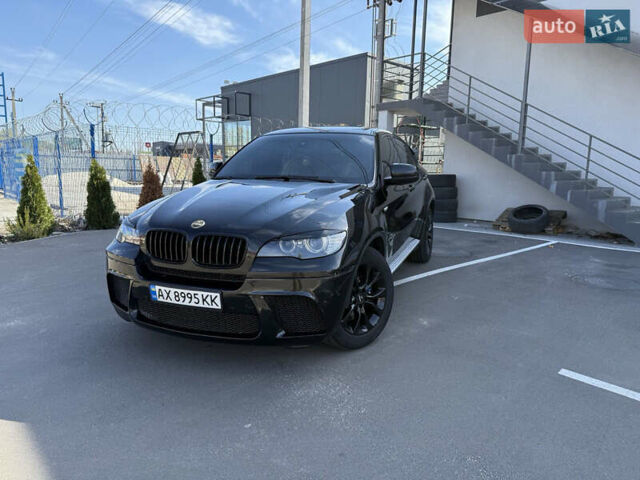 Черный БМВ Х6, объемом двигателя 3 л и пробегом 481 тыс. км за 13000 $, фото 1 на Automoto.ua