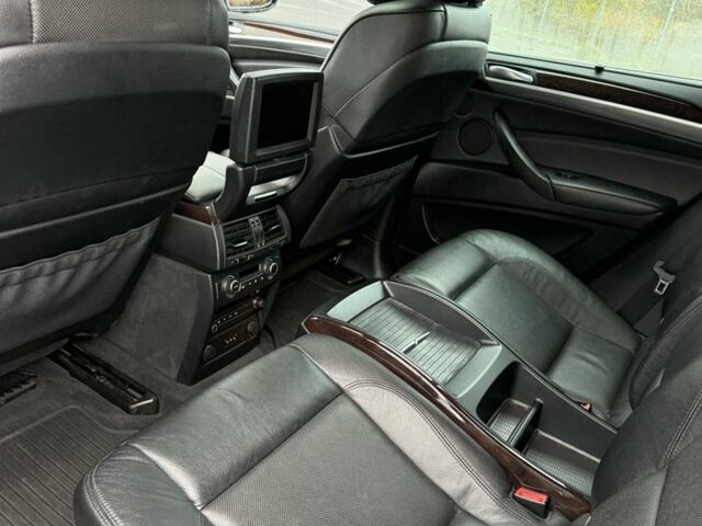 Черный БМВ Х6, объемом двигателя 4.4 л и пробегом 215 тыс. км за 15000 $, фото 5 на Automoto.ua