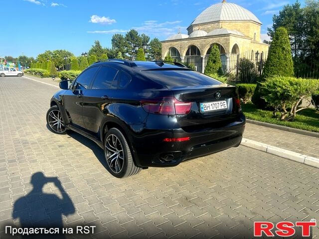 Черный БМВ Х6, объемом двигателя 3 л и пробегом 230 тыс. км за 20999 $, фото 1 на Automoto.ua