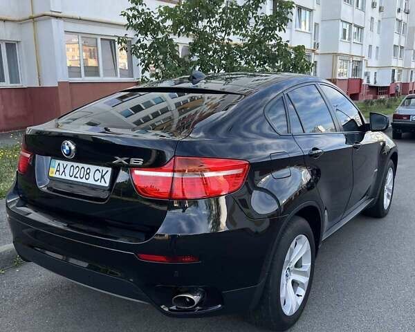 Черный БМВ Х6, объемом двигателя 3 л и пробегом 117 тыс. км за 19200 $, фото 2 на Automoto.ua