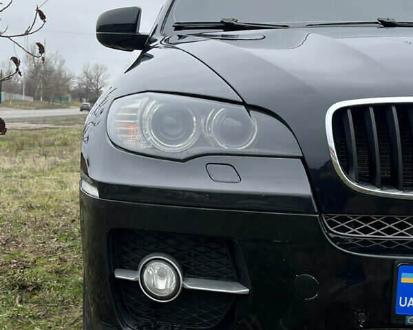 Черный БМВ Х6, объемом двигателя 3 л и пробегом 189 тыс. км за 13200 $, фото 2 на Automoto.ua