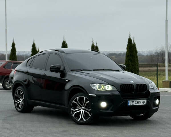 Черный БМВ Х6, объемом двигателя 3 л и пробегом 254 тыс. км за 19700 $, фото 16 на Automoto.ua