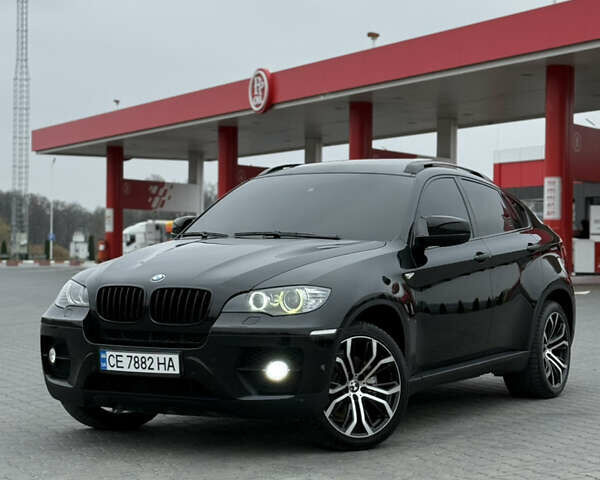 Черный БМВ Х6, объемом двигателя 3 л и пробегом 254 тыс. км за 19700 $, фото 28 на Automoto.ua