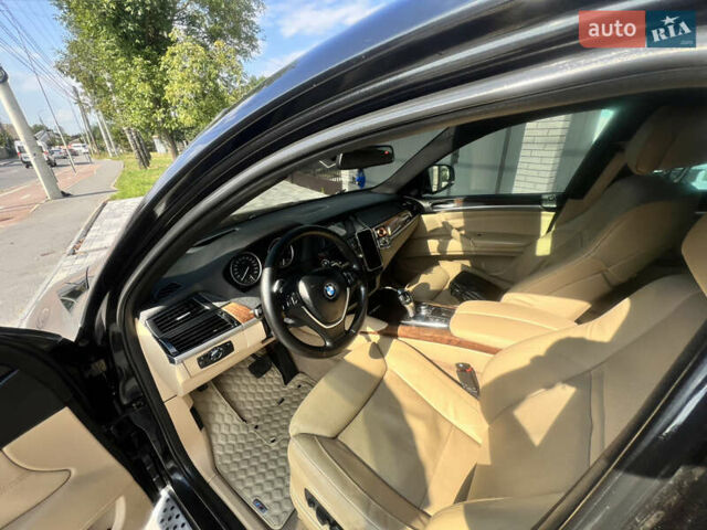 Черный БМВ Х6, объемом двигателя 3 л и пробегом 300 тыс. км за 16550 $, фото 52 на Automoto.ua