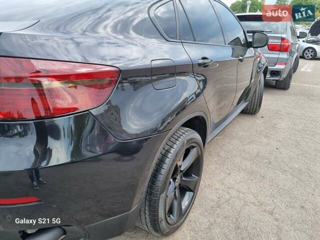 Черный БМВ Х6, объемом двигателя 3 л и пробегом 269 тыс. км за 19999 $, фото 79 на Automoto.ua