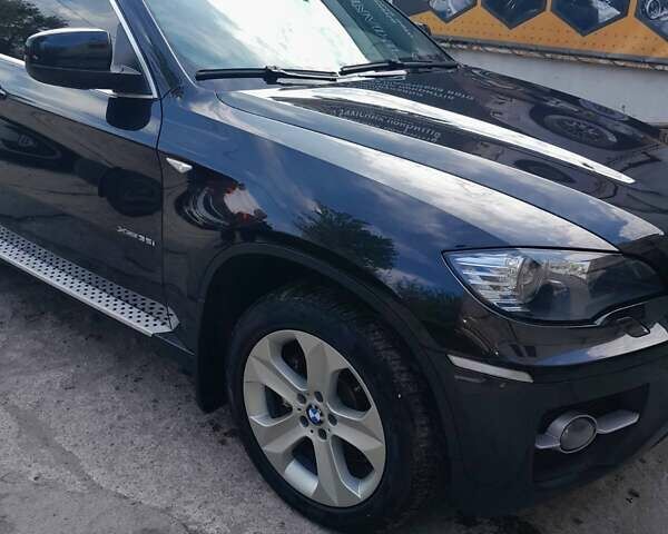 Черный БМВ Х6, объемом двигателя 3 л и пробегом 92 тыс. км за 21000 $, фото 1 на Automoto.ua