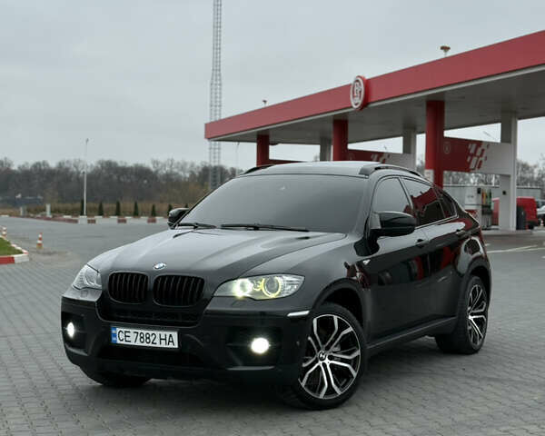 Черный БМВ Х6, объемом двигателя 3 л и пробегом 254 тыс. км за 19700 $, фото 22 на Automoto.ua