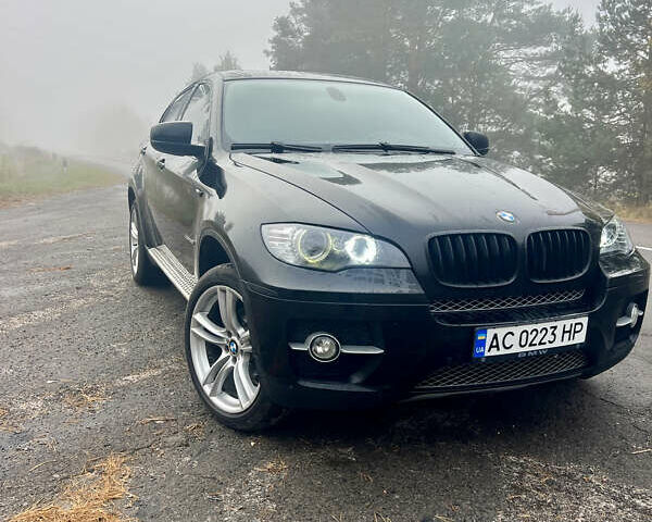 Чорний БМВ Х6, об'ємом двигуна 3 л та пробігом 310 тис. км за 20000 $, фото 5 на Automoto.ua