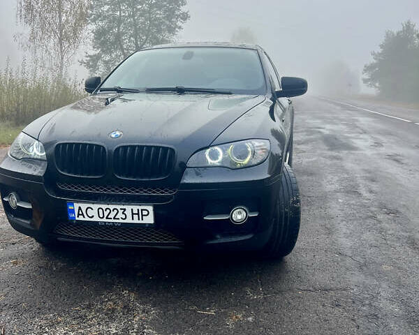 Чорний БМВ Х6, об'ємом двигуна 3 л та пробігом 310 тис. км за 20000 $, фото 4 на Automoto.ua